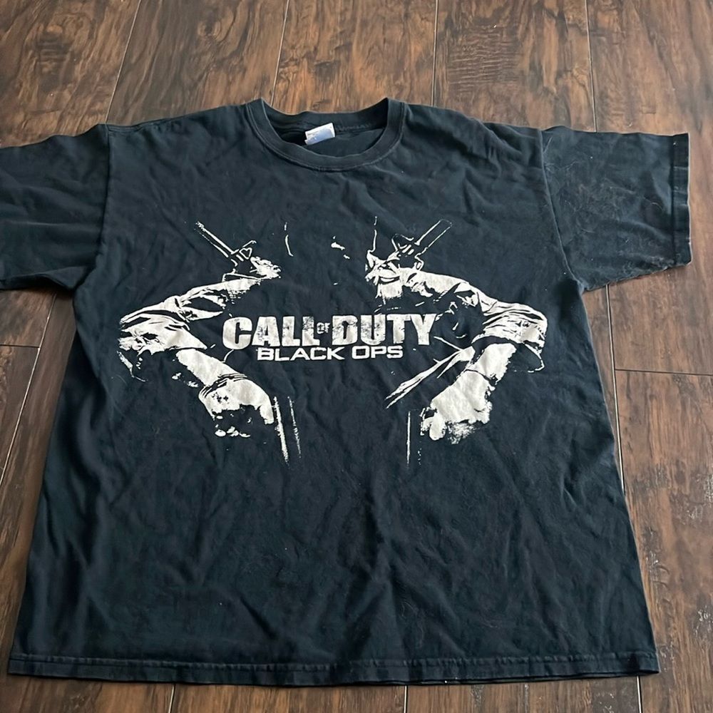Exclusive Game × Playstation‎ × Xbox 360
Call Of Duty BLACK OPS T-shirt size L